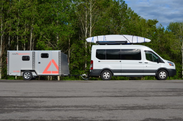 ford transit towing a travel trailer